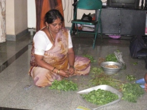 Kulkarni's wife, preparing food.