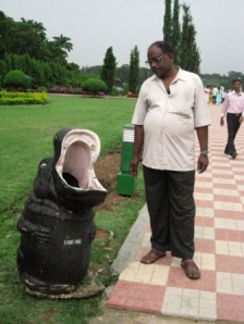 Kulkarni humoring me by standing hear a hippo trashcan.